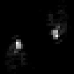 Two bright spots on a shallower diagonal.